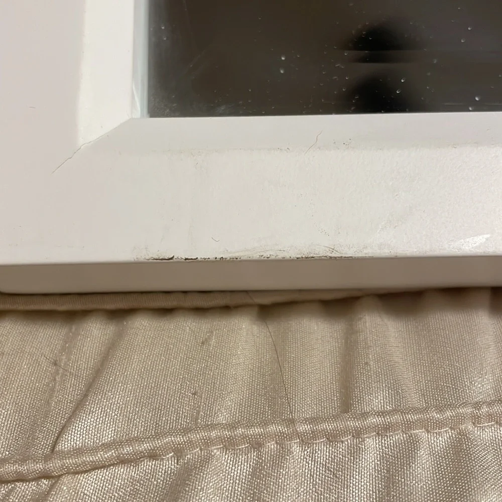White frame square mirror